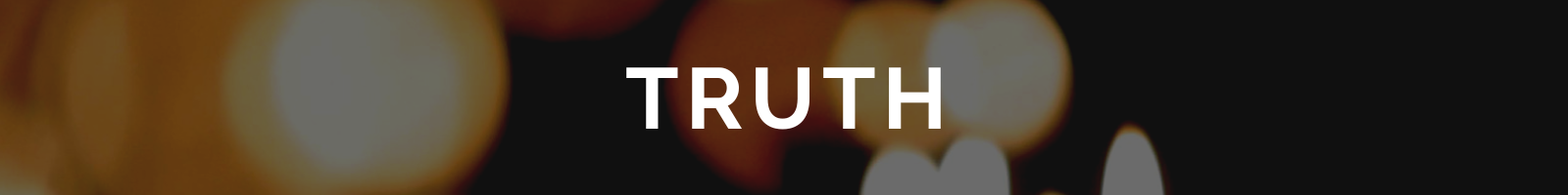 Auto-generated description: The word TRUTH is centered on a background of blurred lights.